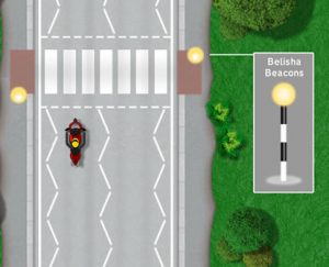 'Belisha Beacon' flashing amber lights at zebra crossings