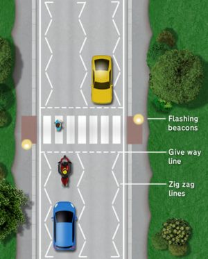 Zebra crossings can be seen from a distance due to the flashing yellow beacons